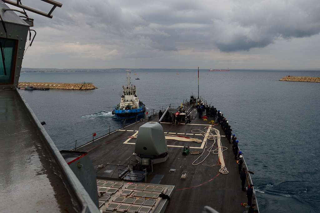 Sailors Man The Rails As The Arleigh Burke Class Guided Missile