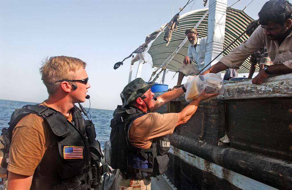 Vessel Board Search and Seizure (VBSS) Team Members from the guided ...