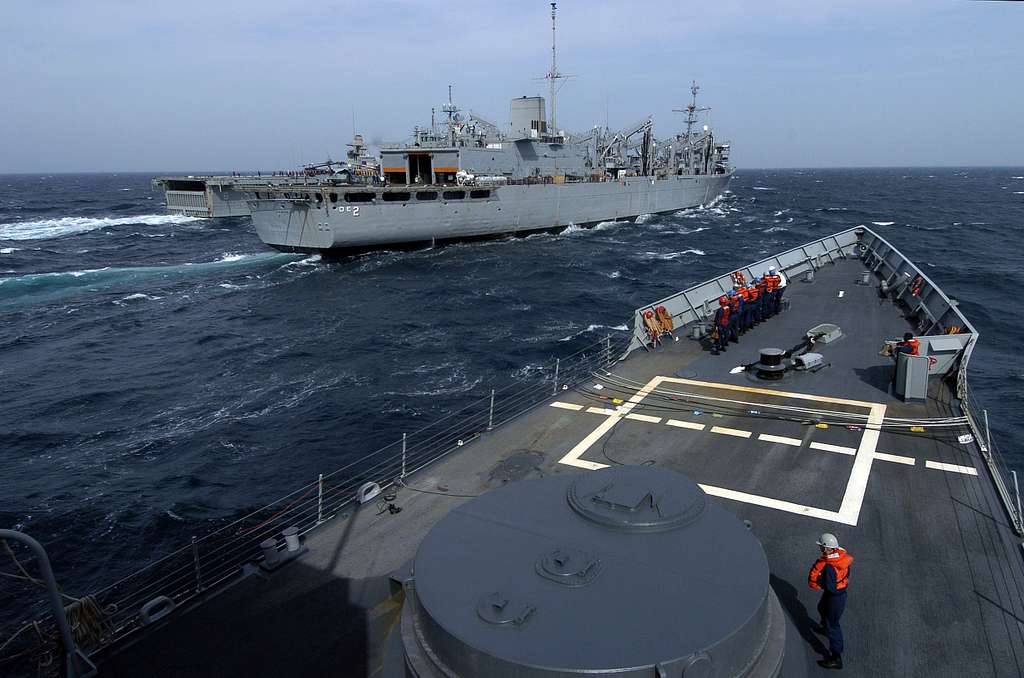 Crew members assigned to the guided missile frigate USS Thach (FFG 43 ...