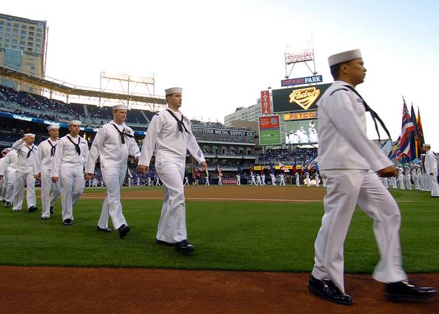 SAN DIEGO (April 24, 2016) Members of the color guard from the aircraft  carrier USS Theodore Roosevelt (CVN 71) parade the colors on the field at  Petco Park, home field of the