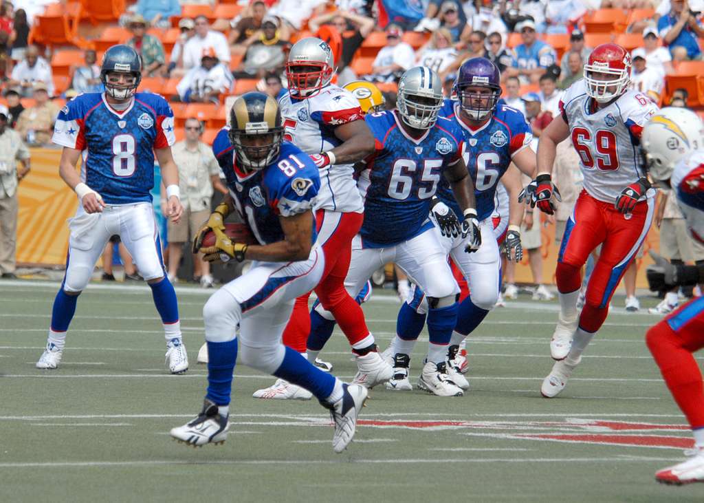 St. Louis Rams wide receiver Tory Holt (#81), playing for the NFC, makes  his way downfield after catching a pass from Seattle Seahawks quarterback  Matt Hasselbeck during the 2008 Pro Bowl game