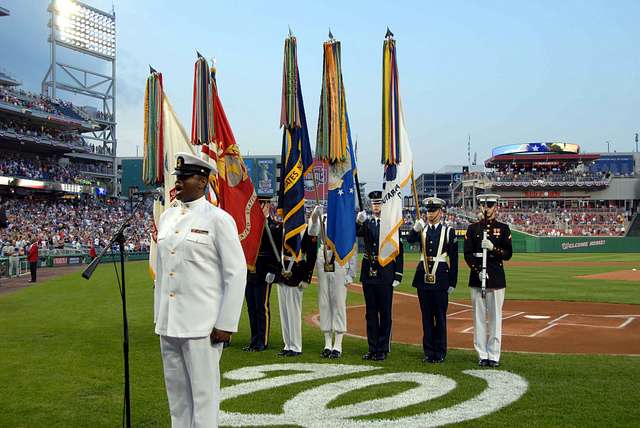 Screech, the Washington Nationals' mascot, offers Chief Navy Career  Counselor Michael Robinson his cover. - PICRYL - Public Domain Media Search  Engine Public Domain Search