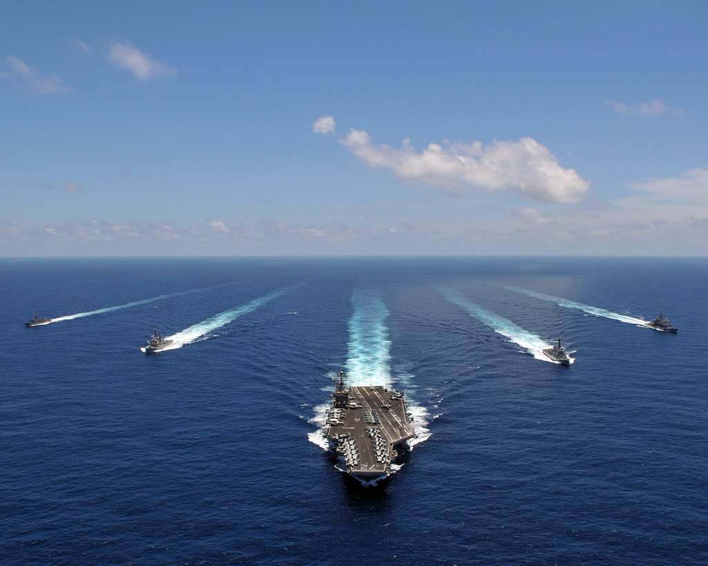 the aircraft carrier uss abraham lincoln cvn 72 leads a formation of ships from the abraham lincoln strike group they transit the indian ocean picryl public domain image the aircraft carrier uss abraham