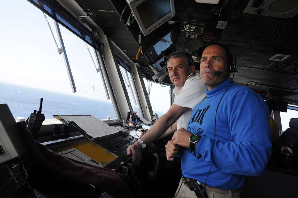 Capt. John Breast, air boss aboard the aircraft carrier USS Ronald ...