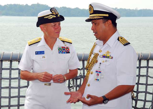 Vice Adm. Nora Tyson, commander, U.S. 3rd Fleet, observes the Ridgetop  Middle School Marching Band during the 69th annual Bremerton Armed Forces  Day Parade in Bremerton, Wash. - PICRYL - Public Domain