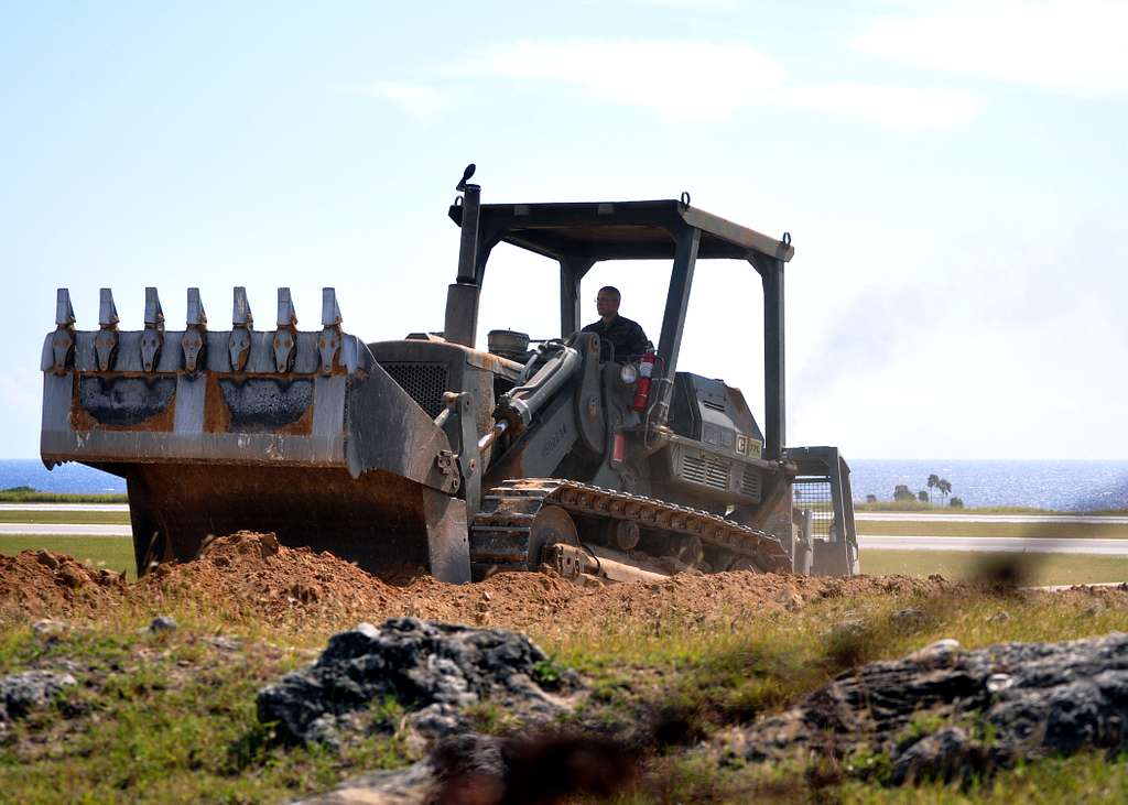 onstruction Mechanic 2nd Class Jacob Seichter operates a bulldozer