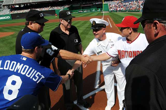 WASHINGTON (May 14, 2019) Screech, the Washington Nationals mascot, shakes  hands with Personnel Specialist 1st Class Angelita Baggoo, Navy Reserve  Sailor of the Year, at Nationals Park in Washington, D.C. - PICRYL 