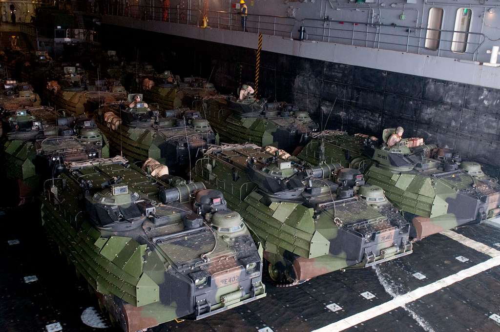 Amphibious assault vehicles prepare to depart the well deck of the San Antonio-class amphibious transport dock ship USS New Orleans (LPD 18). - PICRYL Public Domain Image