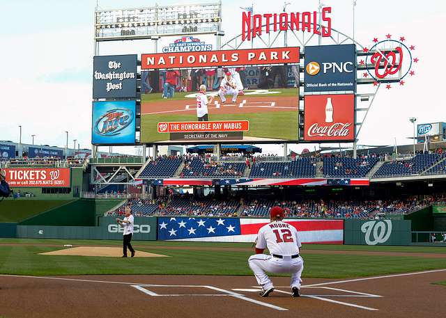 WASHINGTON (May 14, 2019) Screech, the Washington Nationals mascot, shakes  hands with Personnel Specialist 1st Class Angelita Baggoo, Navy Reserve  Sailor of the Year, at Nationals Park in Washington, D.C. - PICRYL 