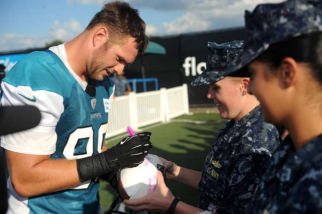 Guy Whimper, Offensive Tackle for the Jacksonville Jaguars, signs sports  memorabilia for Sailors following a Jaguars practice. - PICRYL - Public  Domain Media Search Engine Public Domain Search