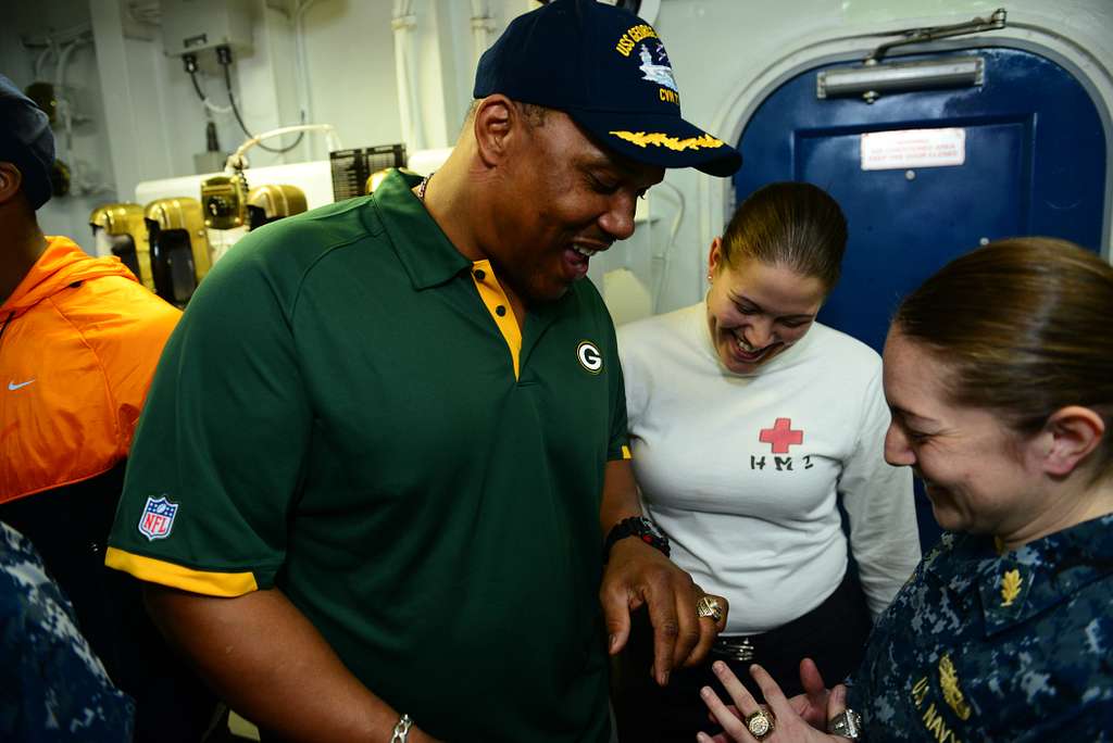 Former Green Bay Packers fullback William Henderson, left, shows his Super  Bowl ring to Hospital Corpsman 2nd Class Gibbi Johnson. - PICRYL - Public  Domain Media Search Engine Public Domain Search