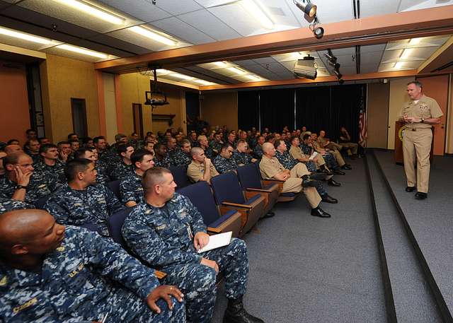 Capt. David Schappert, left, commander of Submarine Squadron 15, observes  the Japan Maritime Self-Defense Force submarine JS Soryu (SS-501) as it  arrives in Apra Harbor, Guam, for a port visit. - PICRYL 