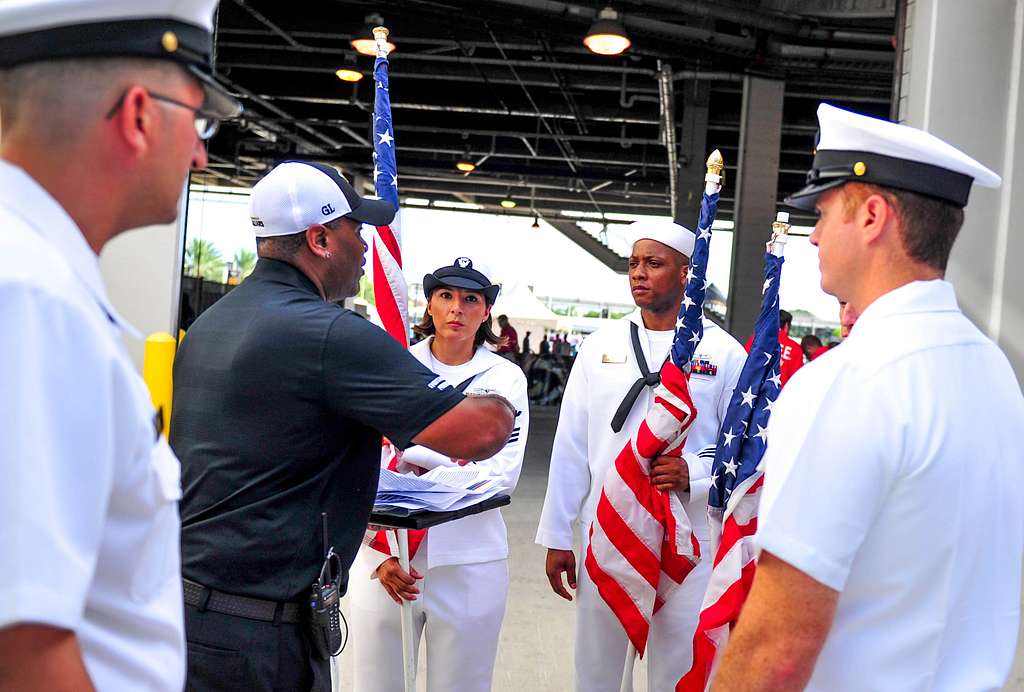 Future recruits from the five branches of the military recite the oath of  enlistment administered by Brig. Gen. Rick McCabe during the halftime show  of the Jacksonville Jaguars vs. San Diego Chargers