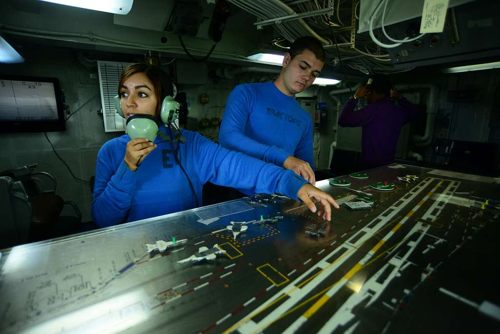 Aviation Boatswain s Mate Handling Airmen Michelle Castillo and