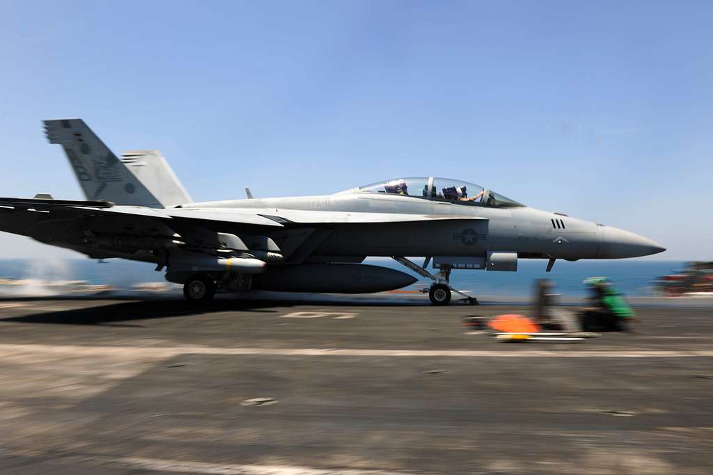 An F A 18f Super Hornet Assigned To The Red Rippers Of Strike Fighter Attack Squadron Vfa 11 Launches From The Flight Deck Of The Aircraft Carrier Uss Theodore Roosevelt Cvn 71 Picryl