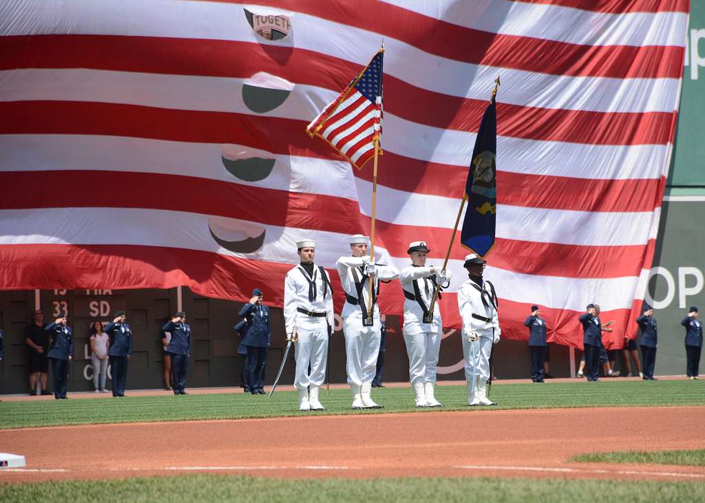 The color guard parades the colors before a Miami Marlins game at