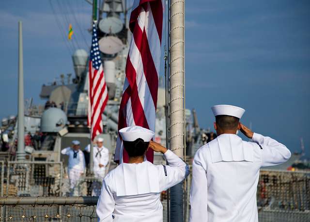 Sailors aboard the Arleigh Burke-class guided-missile destroyers USS ...