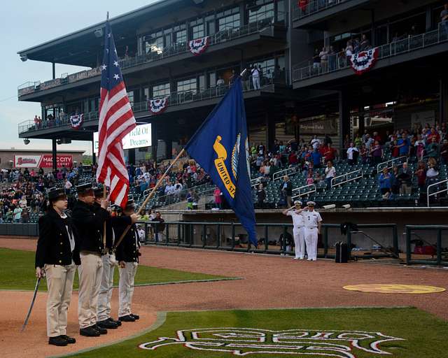 TAMPA, Fla. (May 12, 2018) Sailors assigned to USS Constitution post the  colors at a Tampa Tarpons baseball game during Navy Week Tampa. Tampa is  one of select cities to host a