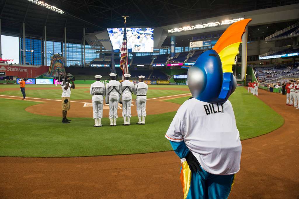 The color guard parades the colors before a Miami Marlins game at