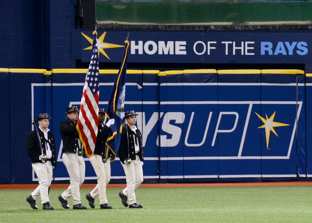 TAMPA, Fla. (May 12, 2018) Sailors assigned to USS Constitution post the  colors at a Tampa Tarpons baseball game during Navy Week Tampa. Tampa is  one of select cities to host a