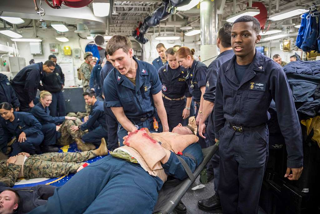 Sailors assigned to the amphibious assault ship USS Wasp (LHD 1 ...