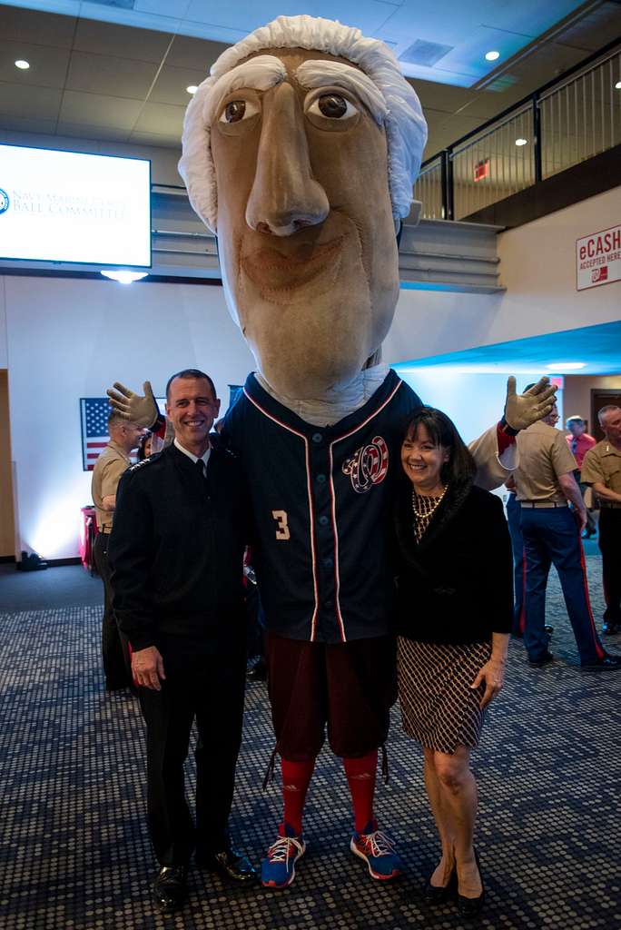 WASHINGTON (May 14, 2019) Screech, the Washington Nationals mascot, shakes  hands with Personnel Specialist 1st Class Angelita Baggoo, Navy Reserve  Sailor of the Year, at Nationals Park in Washington, D.C. - PICRYL 