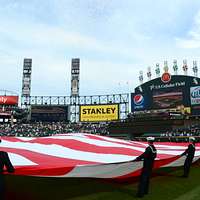 180411-N-SM577-0304 BIRMINGHAM, Ala. (April 11, 2018) Sailors assigned to  USS Constitution post the colors during the national anthem at the opening  day game of the Birmingham Barons baseball team during Navy Week