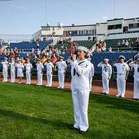 180411-N-SM577-0304 BIRMINGHAM, Ala. (April 11, 2018) Sailors assigned to  USS Constitution post the colors during the national anthem at the opening  day game of the Birmingham Barons baseball team during Navy Week