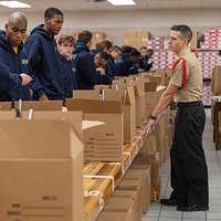 File:US Navy 090430-N-8848T-972 Female recruits wait to have their newly  issued navy working uniform examined by seamstresses at Recruit Training  Command.jpg - Wikimedia Commons